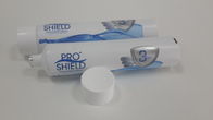 Tubo de crema dental flexible superficial de Matt que empaqueta el casquillo plano laminado del tornillo del envase del tubo